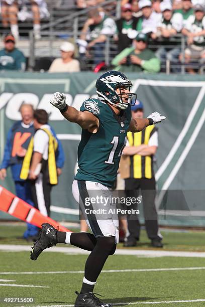 Wide Receiver Riley Cooper of the Philadelphia Eagles signals a teammatel against the New York Jets at MetLife Stadium on September 27, 2015 in East...