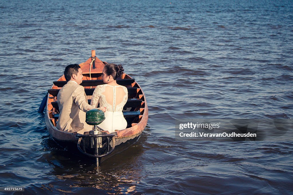 Netherlands, Rear view of couple during boat trip