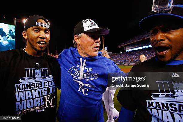 Alcides Escobar of the Kansas City Royals, manager Ned Yost of the Kansas City Royals, and Jarrod Dyson of the Kansas City Royals celebrate after the...