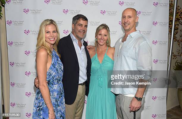 Actress Brooke Burns, film producer Gordon Gray, Kristen Gray, and director Gavin O'Connor attend The Charlotte And Gwenyth Gray Foundation To Cure...