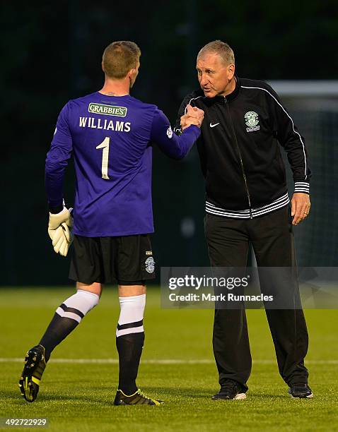 Hibernian manager Terry Butcher congratulates Hibs goalkeeper Ben Williamson after the 2-0 victory over Hamilton Academical during the Scottish...