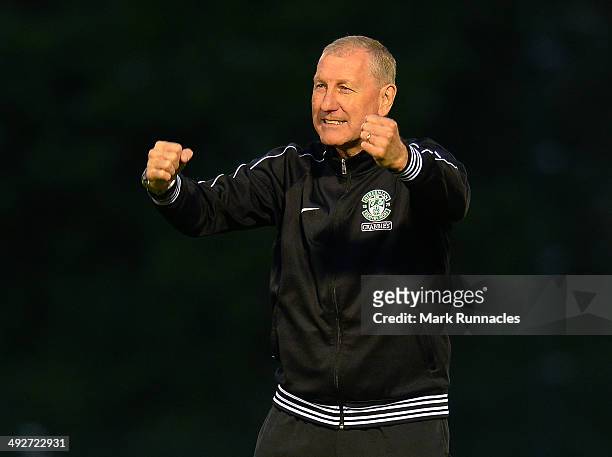 Hibernian manager Terry Butcher celebrates after his team beat Hamilton Academical 2-0 during the Scottish Premiership Play-off Final First Leg,...