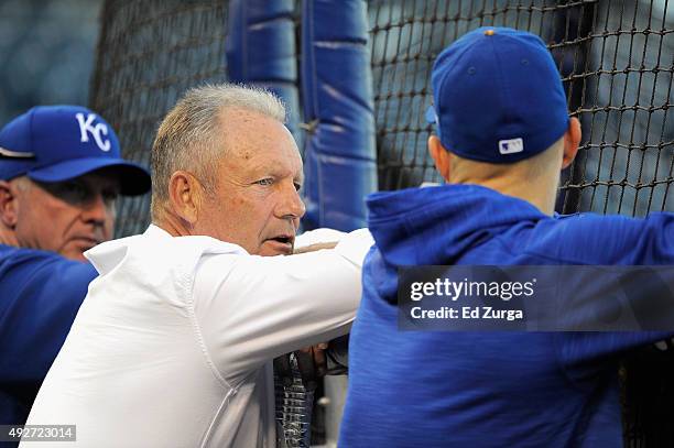 Former Kansas City Royals player George Brett talks to Alex Gordon of the Kansas City Royals prior to game five of the American League Divison Series...