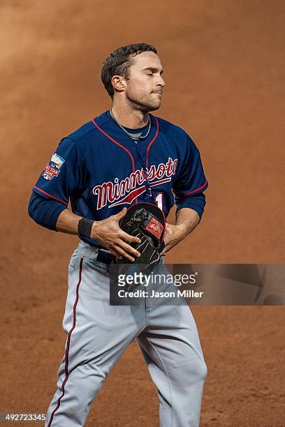 Sam Fuld of the Minnesota Twins reacts after flying out to left fielder Michael Brantley of the Cleveland Indians and ending the fifth inning at...