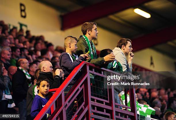 Hibernian fans watch on nervously during the 2-0 victory over Hamilton Academical in the Scottish Premiership Play-off Final First Leg, between...