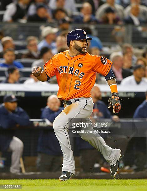 Jonathan Villar of the Houston Astros scores a run against the New York Yankees during the American League Wild Card Game at Yankee Stadium on...