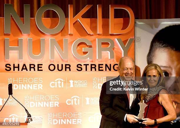 Billy Shore, CEO and Founder of Share Our Strength honors Janet Hayes, Presedent, William-Sonoma onstage at the No Kid Hungry Benefit Dinner at the...