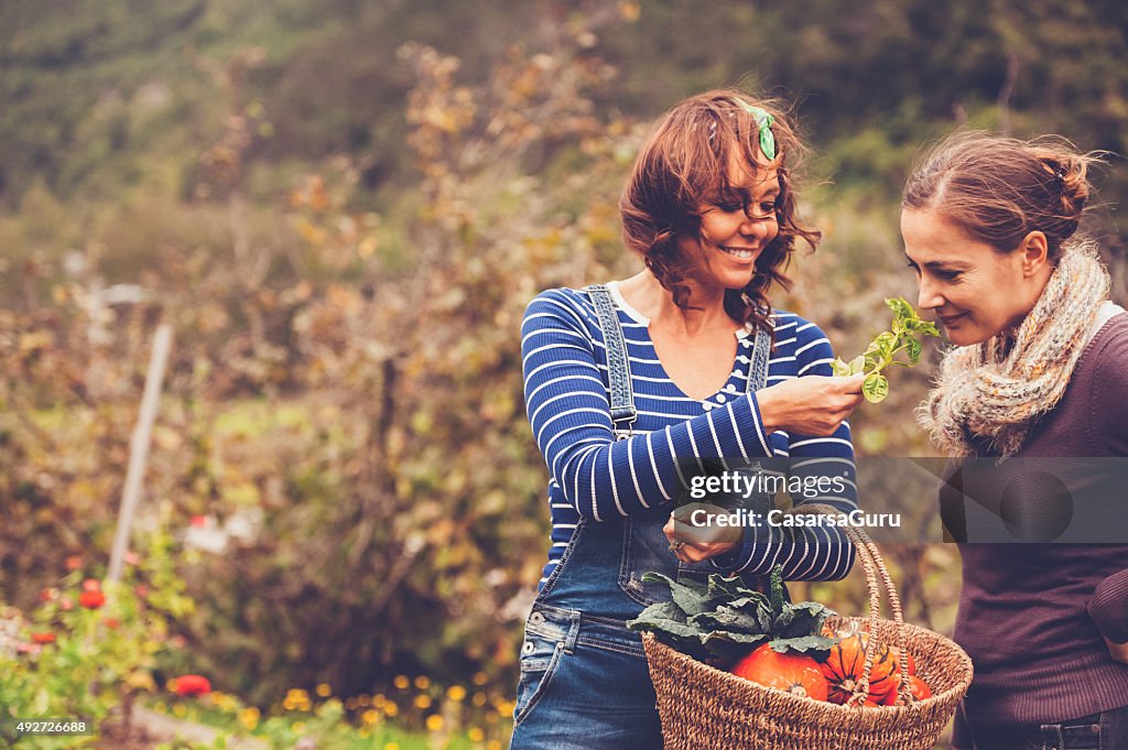 Two Women Enjoying in a Garden