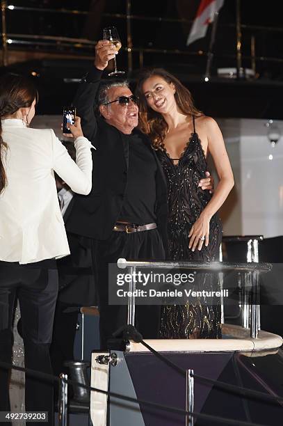 Roberto Cavalli and Irina Shayk attend the Roberto Cavalli yacht party at the 67th Annual Cannes Film Festival on May 21, 2014 in Cannes, France.