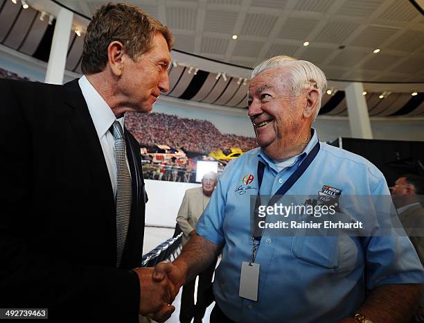 Inductee Bill Elliott, is congratulated by Bobby Allison during the announcement of the NASCAR Hall of Fame Class of 2015 at the NASCAR Hall of Fame...