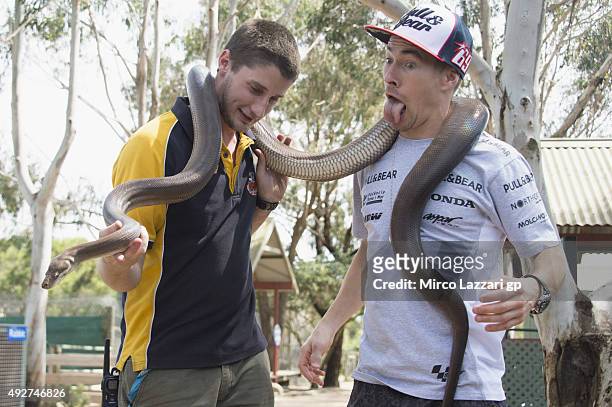Nicky Hayden of USA and Aspar Team MotoGP jokes with a snake during a pre-event at the Maru Koala Park ahead of the 2015 MotoGP of Australia at...