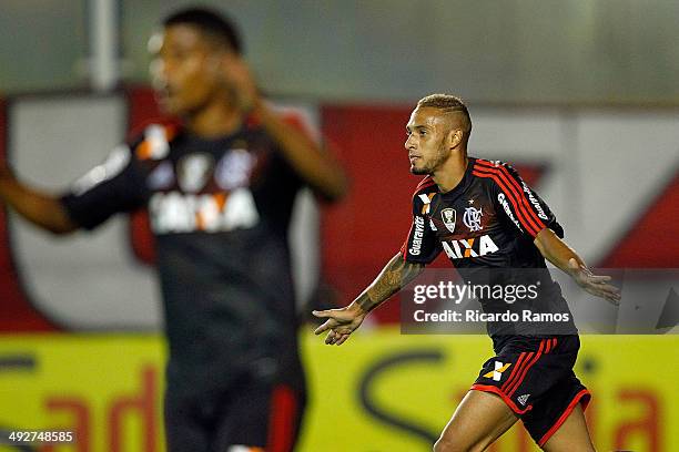 Paulinho of Flamengo celebrates his goal during the match between Flamengo and Bahia as part of Brazilian Series A 2014 at Claudio Moacyr Stadium on...
