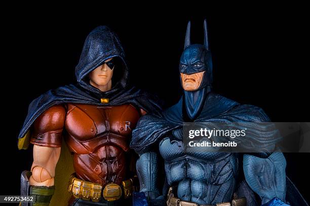 robin and batman - dc comics stock pictures, royalty-free photos & images