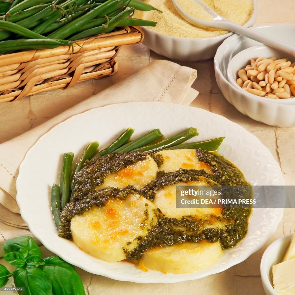 Semolina gnocchi with basil sauce...