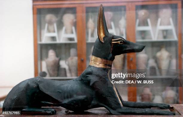 Statue of Anubis in wood and gold leaf, from the Tomb of Tutankhamun. Egyptian civilization, Dynasty XVIII. Cairo, Egyptian Museum
