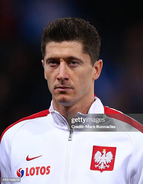 Robert Lewandowski of Poland lines up for the national anthem during the EURO 2016 Qualifier between Scotland and Poland at Hamden Park on October 8,...