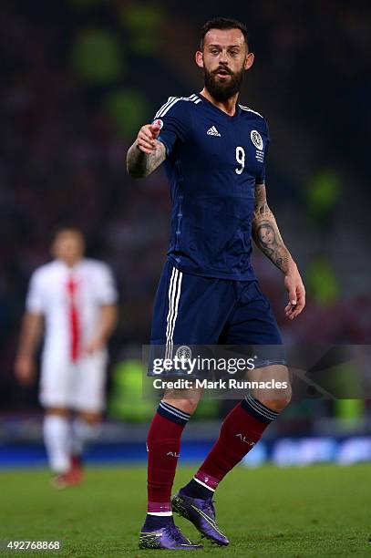 Steven Fletcher of Scotland in action during the EURO 2016 Qualifier between Scotland and Poland at Hamden Park on October 8, 2015 in Glasgow,...