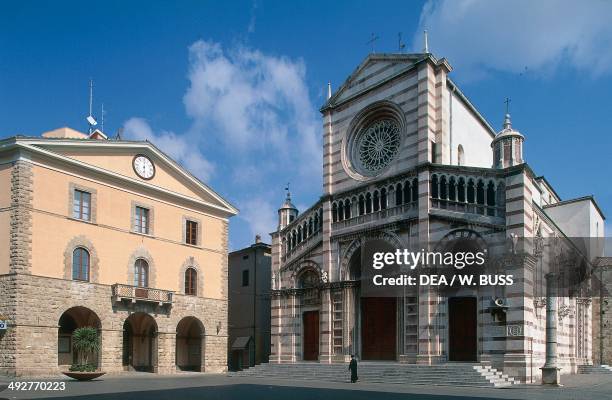 Grosseto cathedral, 1294-1302, with the town hall on the left, Grosseto, Tuscany, Italy.