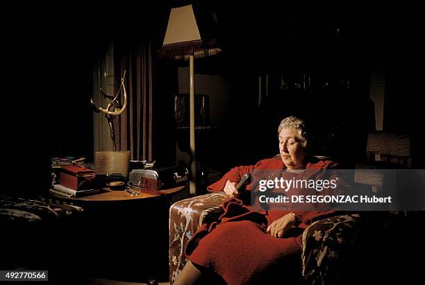 The novelist Agatha Christie poses at home on december 1956 in Wallingford, United Kingdom.