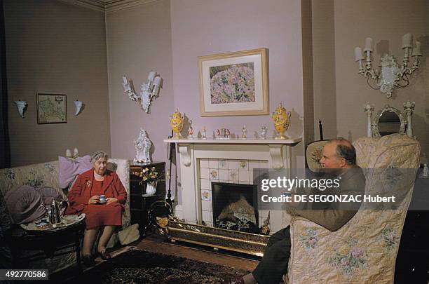 The novelist Agatha Christie poses at home on december 1956 in Wallingford, United Kingdom.