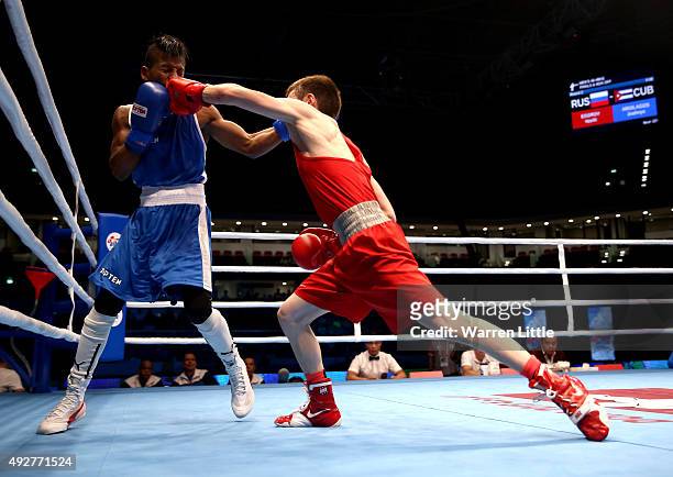 Vasilii Egorov of Russia fights Joahnys Argilagos of Cuba in the final of the Men's Light Fly Weight during the AIBA World Boxing Championships Doha...