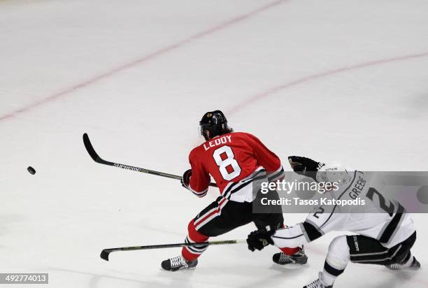 Nick Leddy of the Chicago Blackhawks shoots a goal against the defense of Matt Greene of the Los Angeles Kings in the first period in Game Two of the...