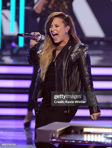 Singer Demi Lovato performs onstage during Fox's "American Idol" XIII Finale at Nokia Theatre L.A. Live on May 21, 2014 in Los Angeles, California.