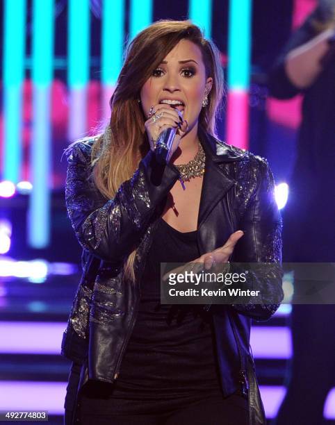 Singer Demi Lovato performs onstage during Fox's "American Idol" XIII Finale at Nokia Theatre L.A. Live on May 21, 2014 in Los Angeles, California.
