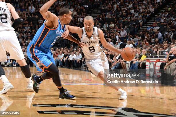 Tony Parker of the San Antonio Spurs handles the ball against the Oklahoma City Thunder in Game Two of the Western Conference Finals during the 2014...
