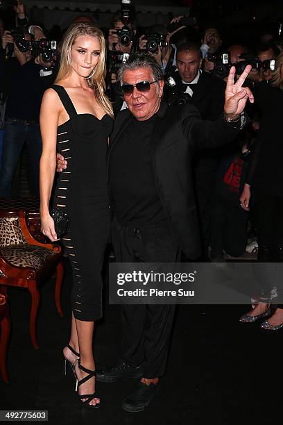 Rosie Huntington Whiteley and Roberto Cavalli attend the "Roberto Cavalli Annual Party Aboard" : Outside Arrivals at the 67th Annual Cannes Film...