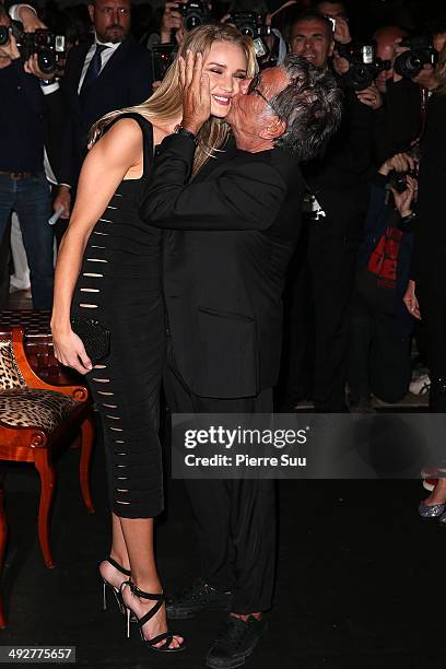 Rosie Huntington Whiteley and Roberto Cavalli attend the "Roberto Cavalli Annual Party Aboard" : Outside Arrivals at the 67th Annual Cannes Film...