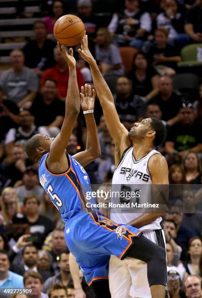 Kevin Durant of the Oklahoma City Thunder has his shot blocked by Tim Duncan of the San Antonio Spurs in the first quarter in Game Two of the Western...