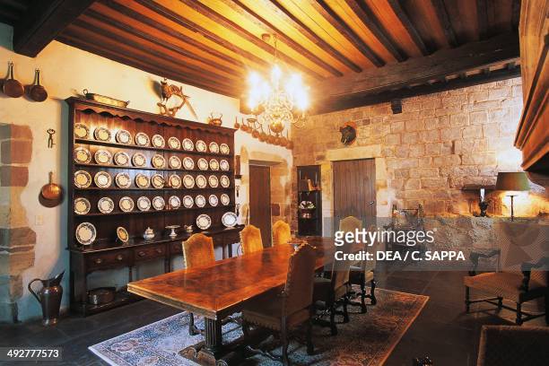 Dining room with large display cabinet, Chateau d'Etchauz, Saint-Etienne-de-Baigorry, Aquitaine, France.