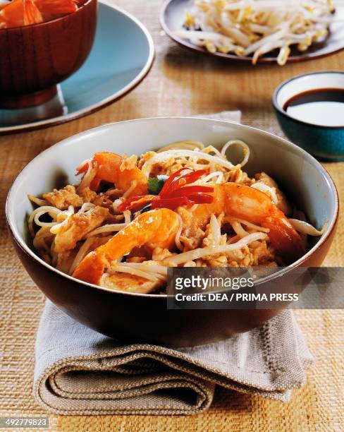 Stir-fried soy noodles with prawns and bean sprouts, Malaysia.