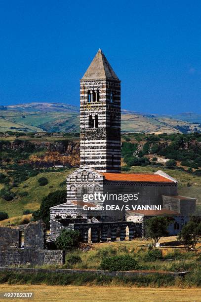 Basilica of the Holy Trinity of Saccargia, 12th century, Romanesque style, construced from black trachyte and white limestone, Codrongianus,...