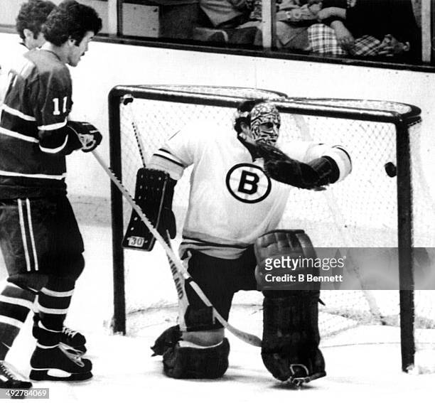 Goalie Gerry Cheevers of the Boston Bruins can't save the goal as Yvon Lambert of the Montreal Canadiens looks on during Game 6 of the 1978 Stanley...