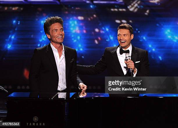 Musician Richard Marx and host Ryan Seacrest perform onstage during Fox's "American Idol" XIII Finale at Nokia Theatre L.A. Live on May 21, 2014 in...
