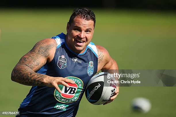 Anthony Watmough runs the ball during a New South Wales Blues State of Origin training session at Novotel Coffs Harbour on May 22, 2014 in Coffs...