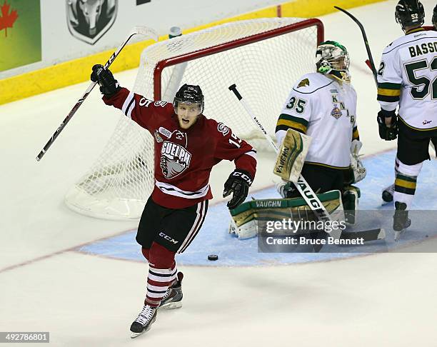 Marc Stevens of the Guelph Storm scores a third period goal against the London Knights during the 2014 Memorial Cup tournament at Budweiser Gardens...