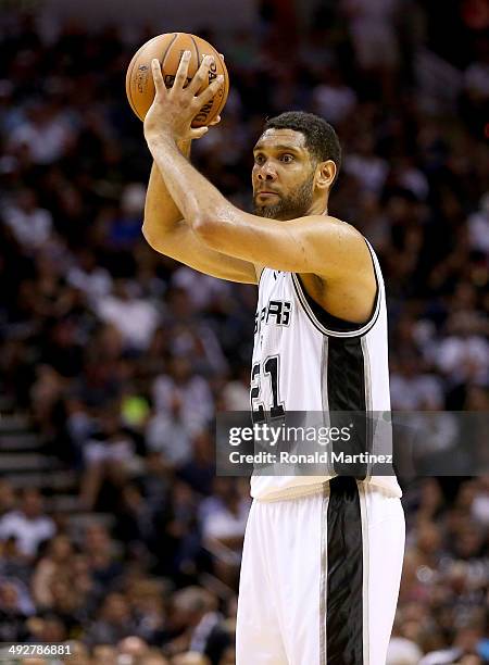 Tim Duncan of the San Antonio Spurs with the ball in the first half while taking on the Oklahoma City Thunder in Game Two of the Western Conference...