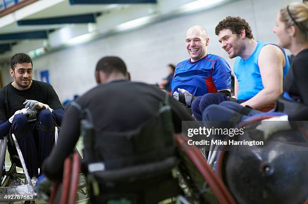 disabled wheelchair rugby athletes in sports hall - wheelchair rugby stock-fotos und bilder
