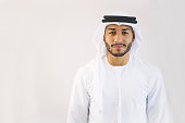 Content Young Arab Man in Traditional Clothing