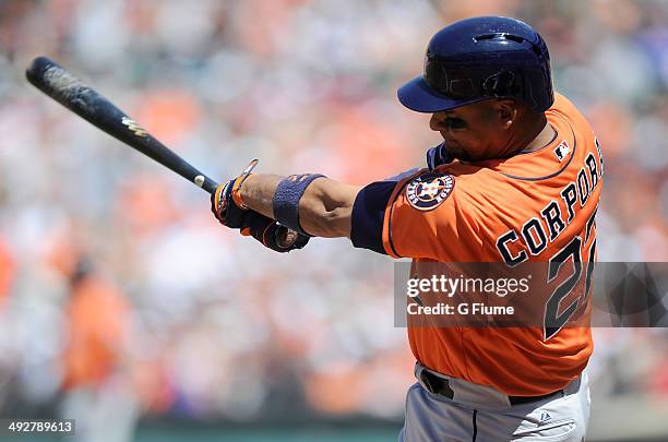 Carlos Corporan of the Houston Astros bats against the Baltimore Orioles at Oriole Park at Camden Yards on May 11, 2014 in Baltimore, Maryland.