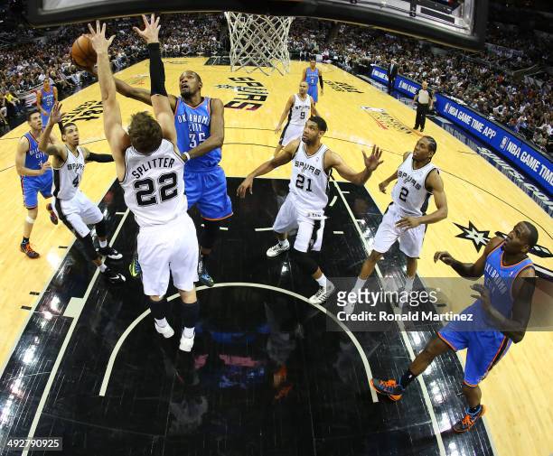 Kevin Durant of the Oklahoma City Thunder goes up for a shot against Tiago Splitter of the San Antonio Spurs in the first half in Game Two of the...