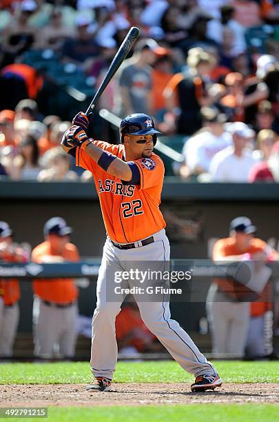 Carlos Corporan of the Houston Astros bats against the Baltimore Orioles at Oriole Park at Camden Yards on May 11, 2014 in Baltimore, Maryland.