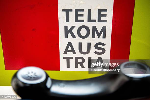 Telekom Austria AG logo sits inside a fixed-line public telephone booth, operated by Telekom Austria AG, in Vienna, Austria, on Wednesday, Oct. 14,...