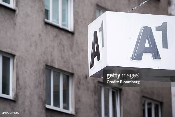 An A1 logo sits on the sign outside an A1 store, operated by Telekom Austria AG, in Vienna, Austria, on Wednesday, Oct. 14, 2015. Telekom Austria is...