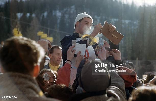 Winter Olympics: View of Austria Toni Sailer victorious, signing autographs after Giant Slalom run at Ilio Colli run on Monte Faloria. Sailer was the...