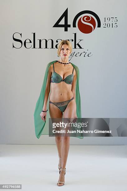 Model walks the runway during the Selmark fashion show at Circulo de las Bellas Artes on October 15, 2015 in Madrid, Spain.
