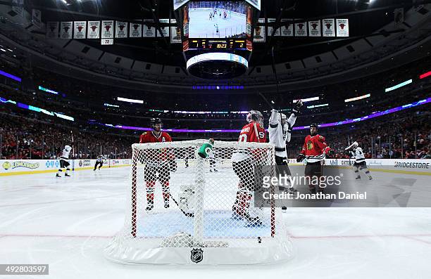 Corey Crawford of the Chicago Blackhawks reacts after Drew Doughty of the Los Angeles Kings scored a goal in the third period of Game Two of the...